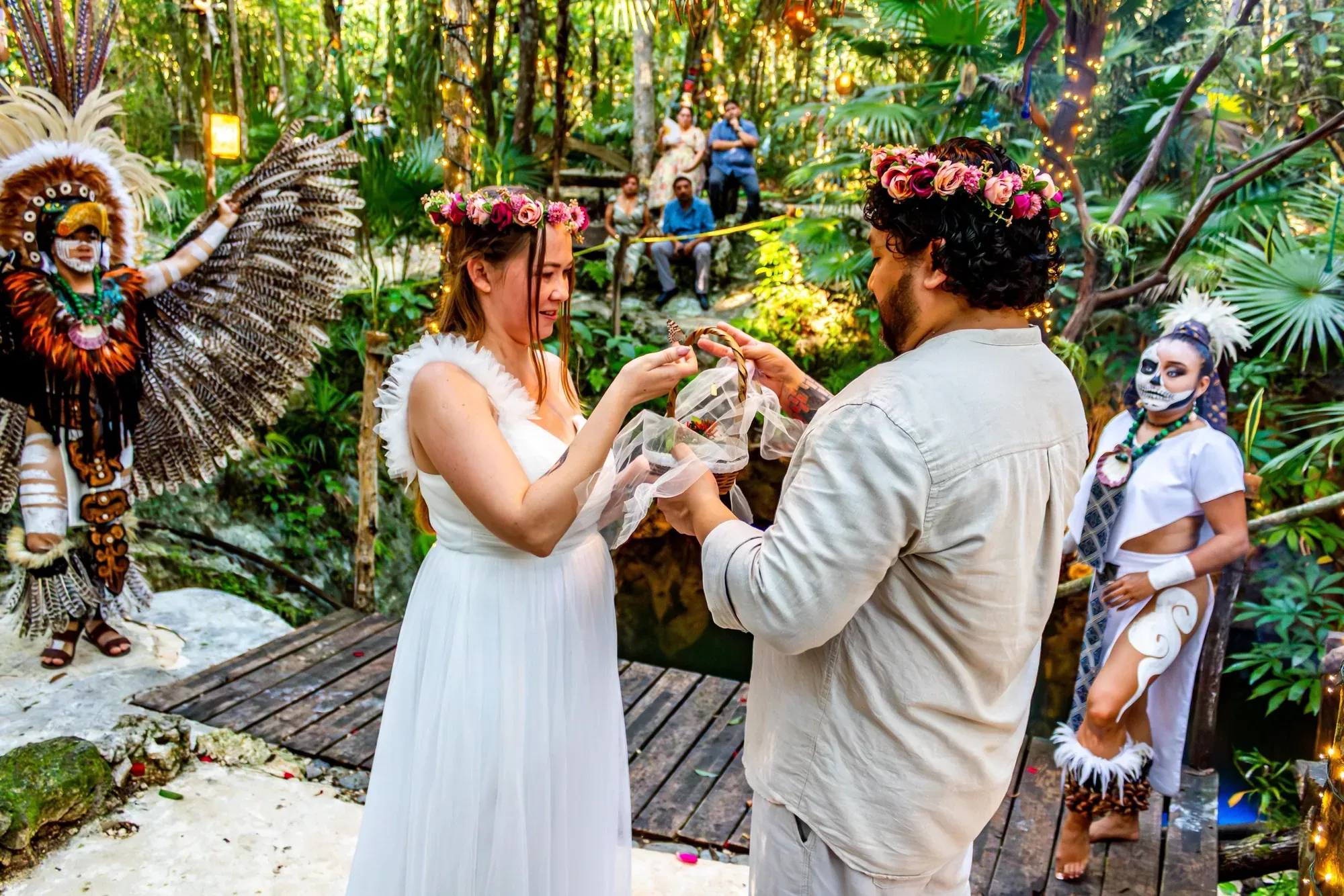 Couple taking part in a traditional Mayan ceremony in the jungle