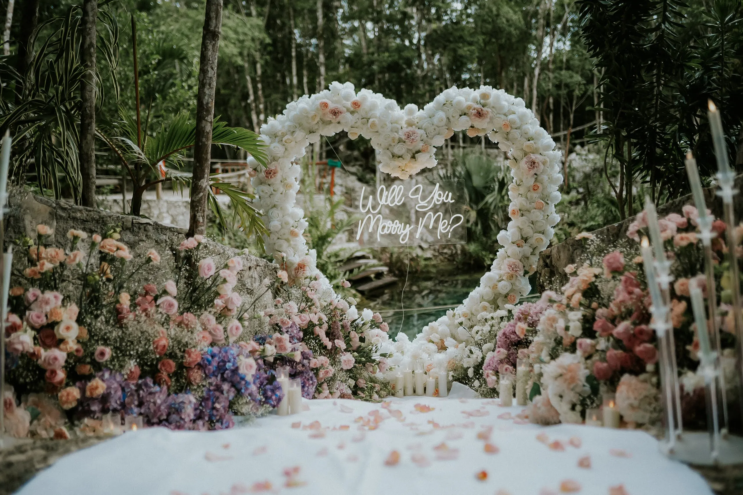 Engaged couple in sacred cenote