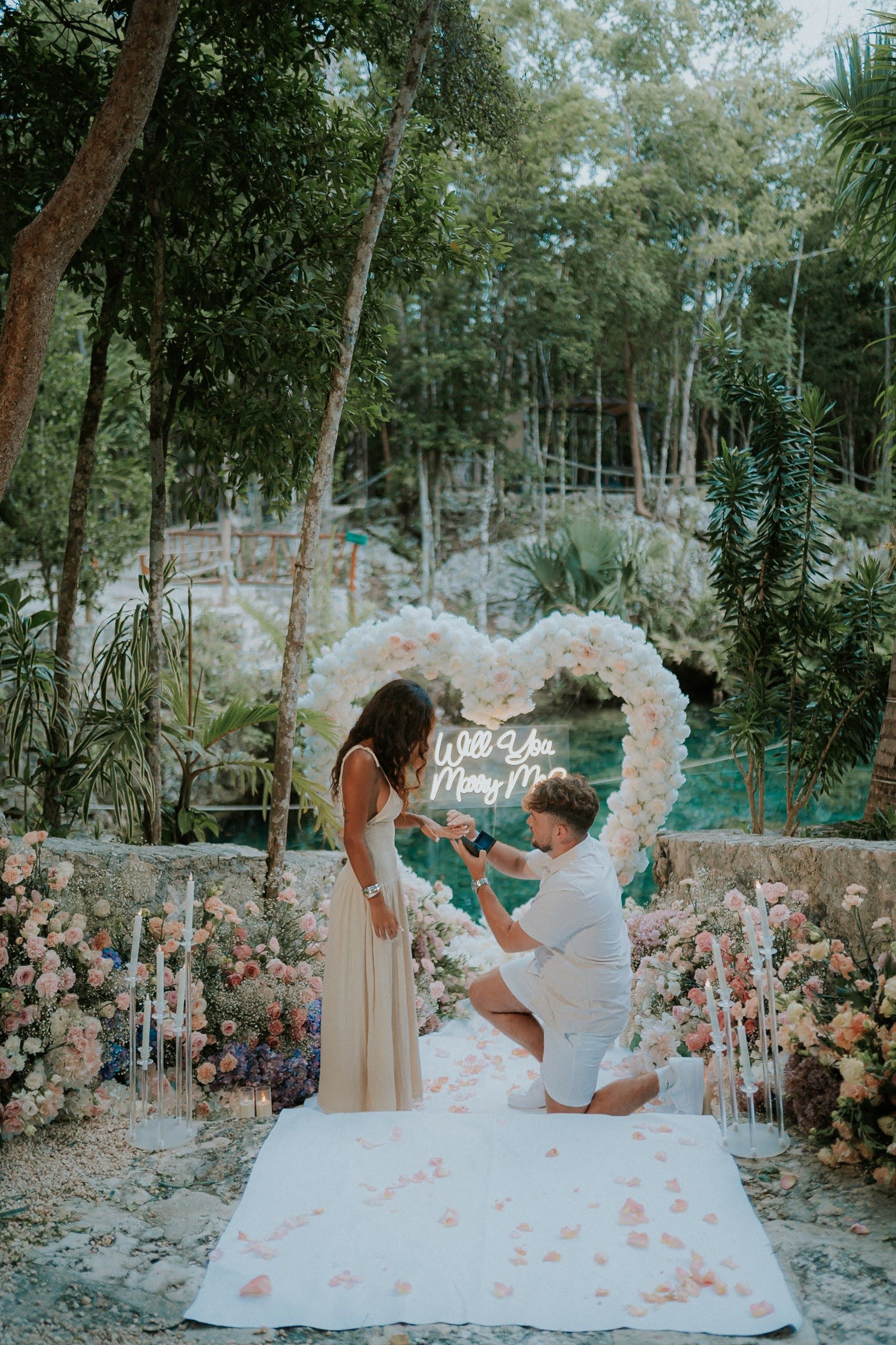 Intimate moment in a hidden underground cenote cavern near Cancun, perfectly curated by Amar for a romantic proposal.