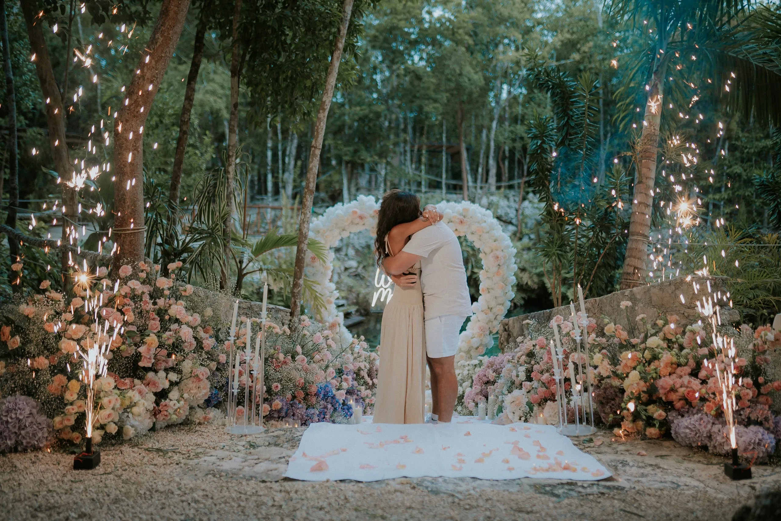 Stunning cenote proposal with floral arch