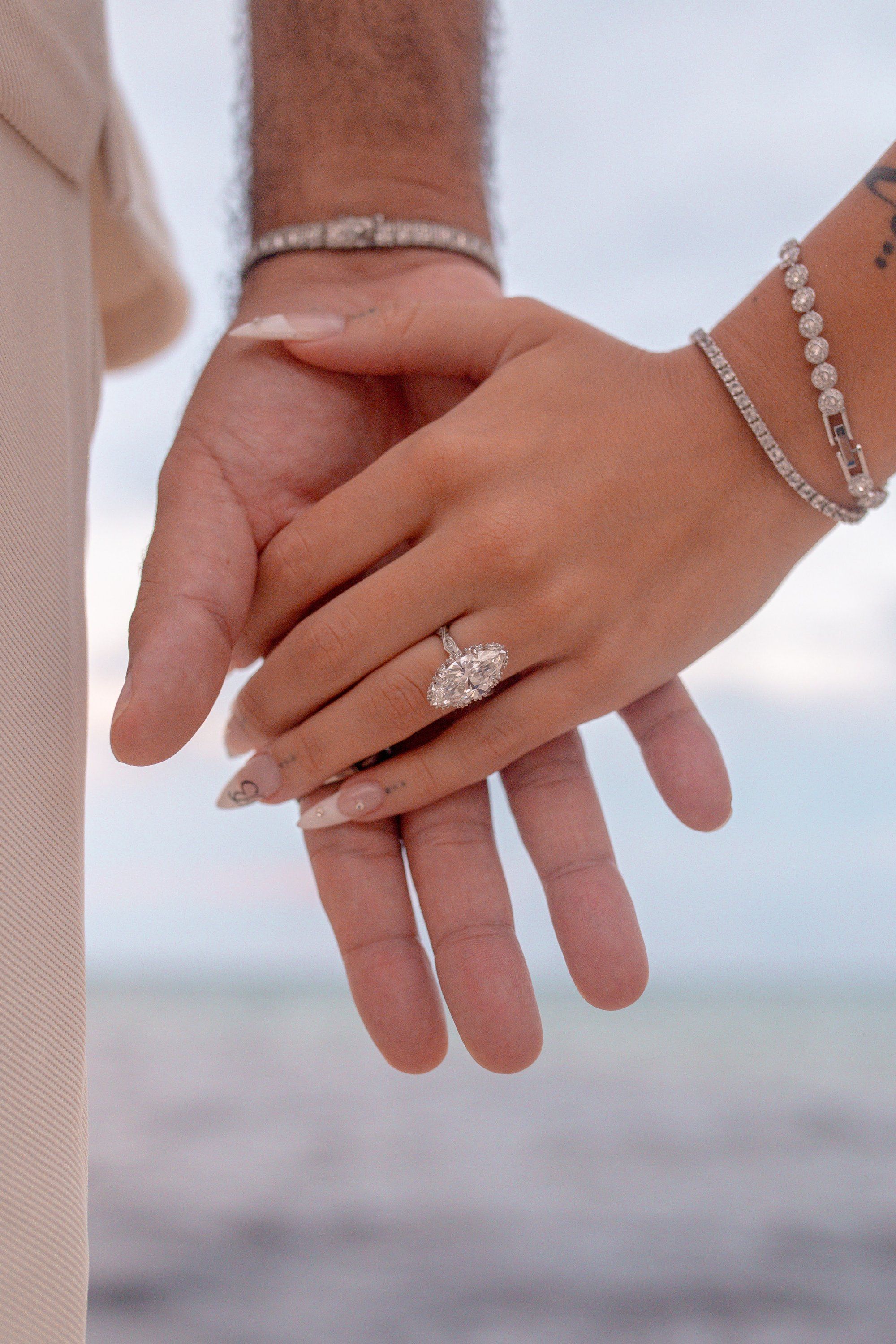 A couple holding hands, symbolizing connection and presence