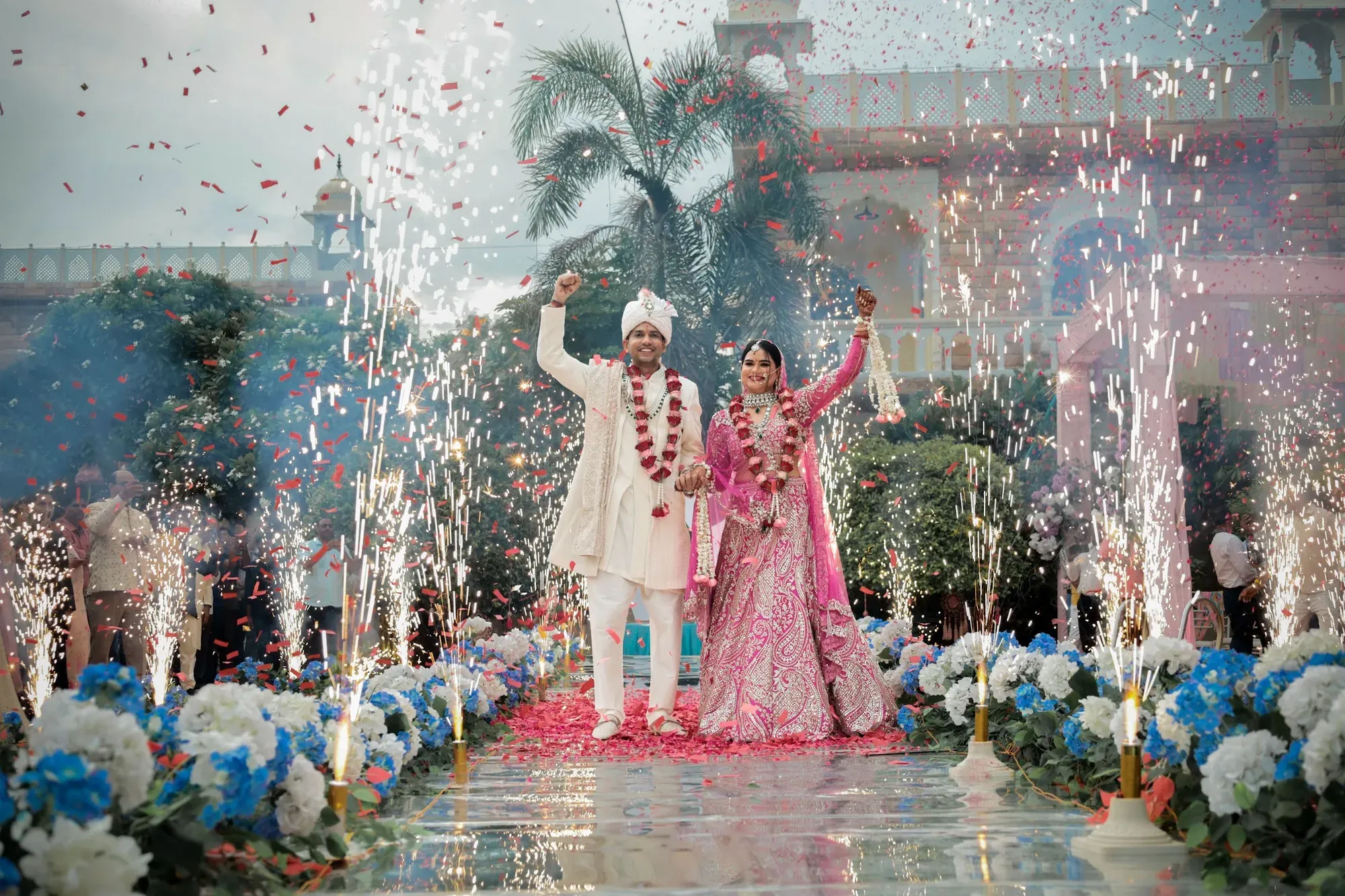 Couple celebrating beneath a shower of confetti